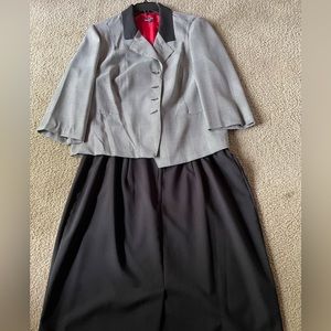 Formal Skirt set. Never worn. Black skirt and check coat. Excellent condition